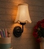 Black Wall Mounted Light with Beige Jute Shade & Hallway