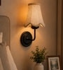 Black Wall Mounted Light with Beige Jute Shade & Hallway