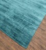 Blue Solid Viscose 5 ft X 8 ft Hand Woven Rectangle Carpet