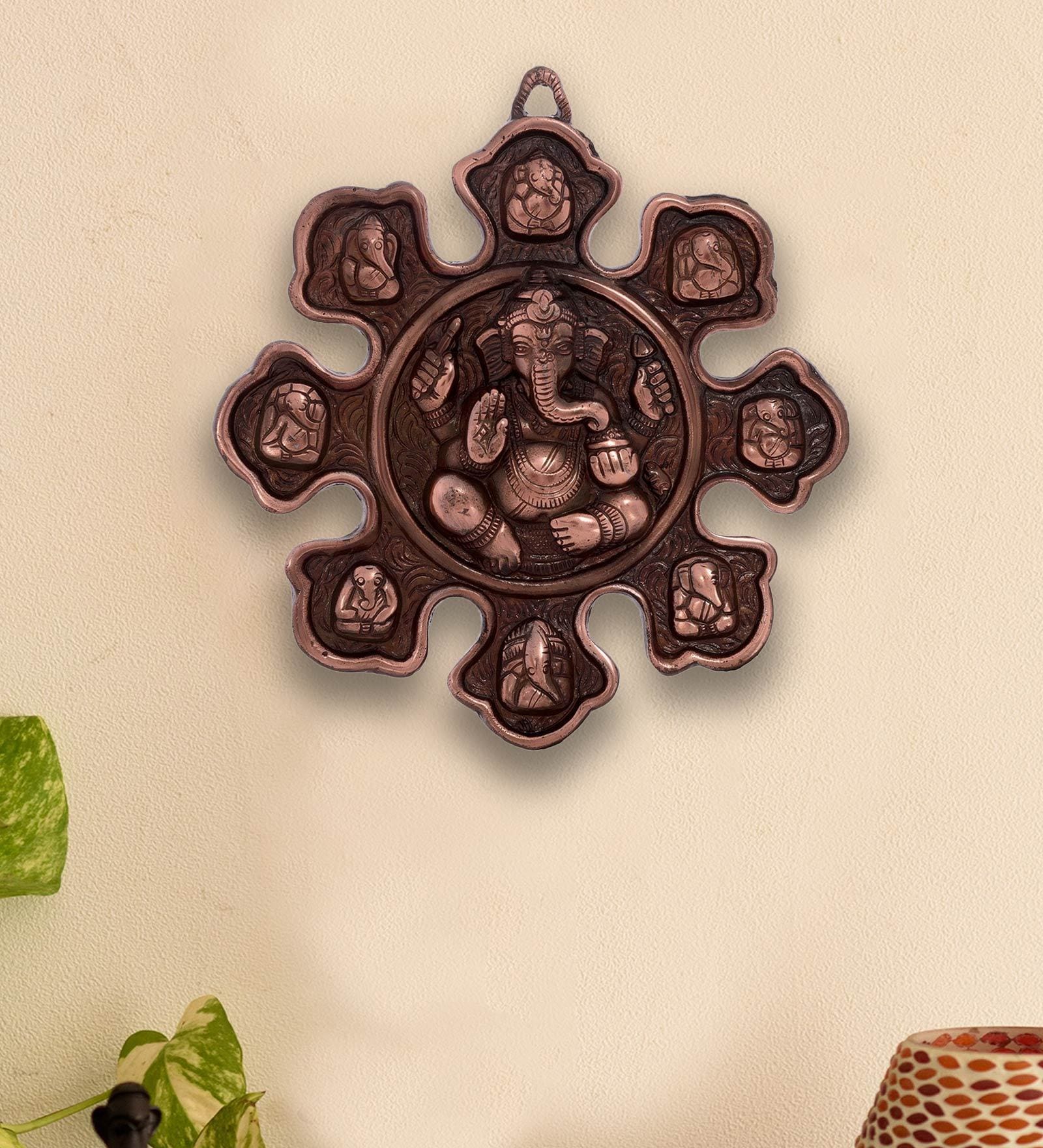 Brown Metal Wall Hanging With 9 Variants Of Lord Ganesha
