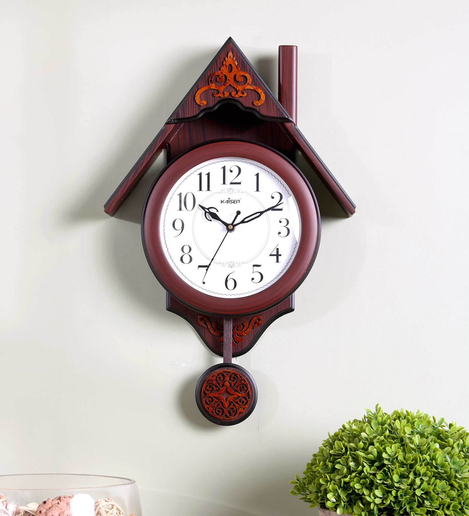 Buy Brown Wooden Abstract Shape Pendulum Clock at 23 OFF by Kaiser Pepperfry