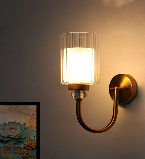 Brass Wall Sconce with Clear Cylindrical Ribbed Glass