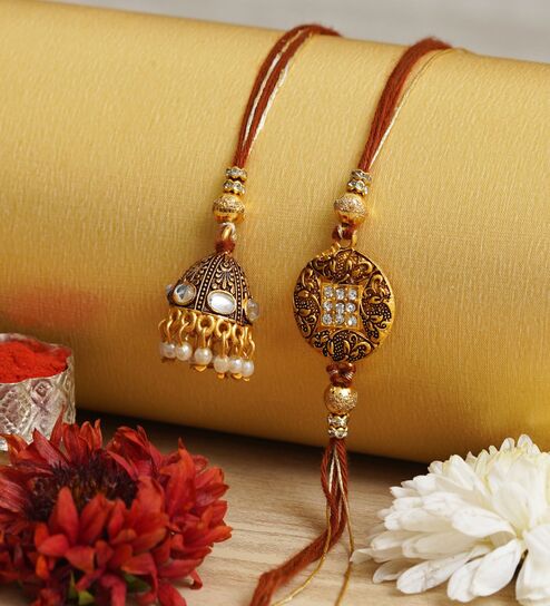 Brown & Golden Bhaiya Bhabhi Rakhi Set with Roli Chawal Pack