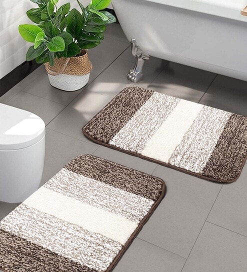 https://ii1.pepperfry.com/media/catalog/product/b/r/494x544/brown-geometric--microfibre-20x14-inches-antiskid-bath-mat--set-of-2--by-saral-home-brown-geometric--fnhq49.jpg