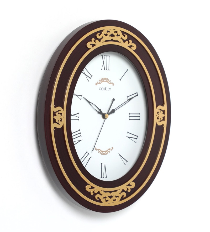 Buy Brown Wooden Oval Shape Clock with Hand Made Design by Caliber