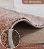 Brown and Beige Abstract Polypropylene 7 ft x 5 ft Machine Made Carpet