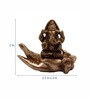 Brown Brass Ganesha on Palm Statue