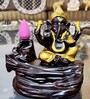 Brown Lord Ganesha Decorative Showpiece with 10 free Smoke Backflow Scented Cone Incenses