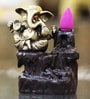 Golden Lord Ganesha Decorative Showpiece with 10 free Smoke Backflow Scented Cone Incenses