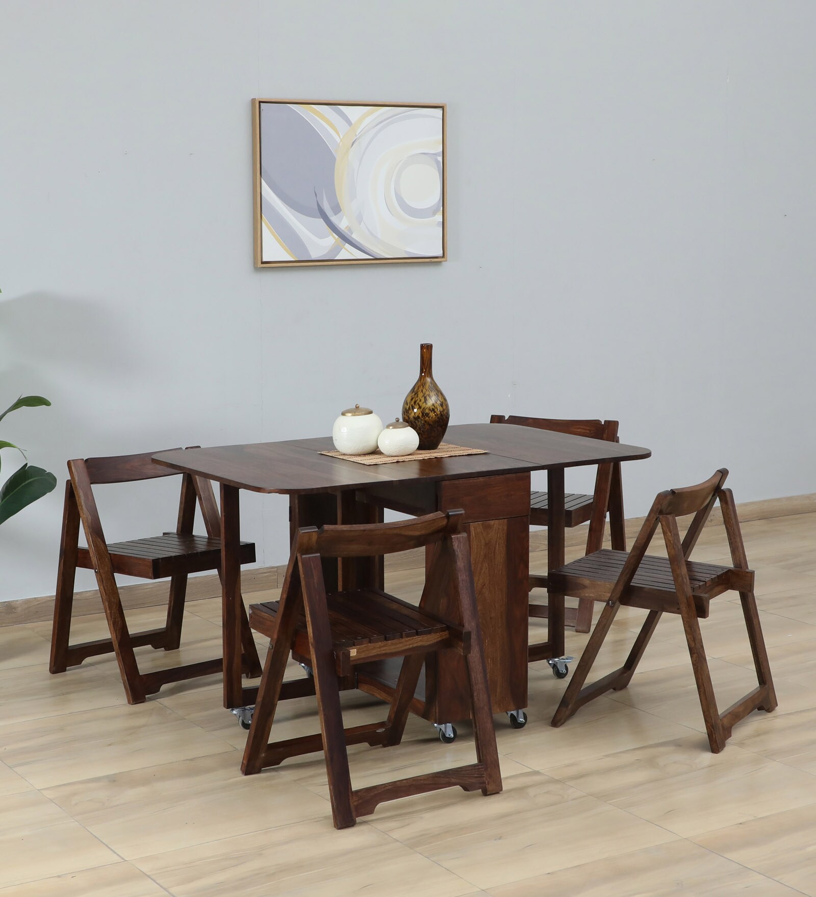 Carion Sheesham Wood 4 Seater Foldable Dining Set In Scratch Resistant Provincial Teak Finish Carion Sheesham Wood 4 Seater Foldable Dining Set In Scratch Resistant Provincial Teak Finish