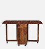 Carion Sheesham Wood 4 Seater Foldable Dining Set In Scratch Resistant Honey Oak Finish Carion Sheesham Wood 4 Seater Foldable Dining Set In Scratch Resistant Honey Oak Finish