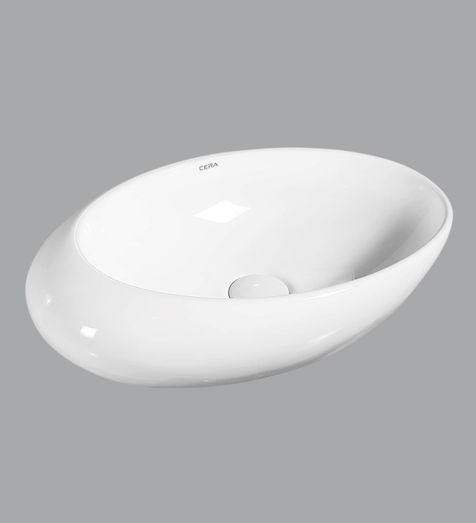 Buy Ceramic Oval Shape White Counter Top Wash Basin (H 7, W 19.6, D 12.4 Inches) by CERA