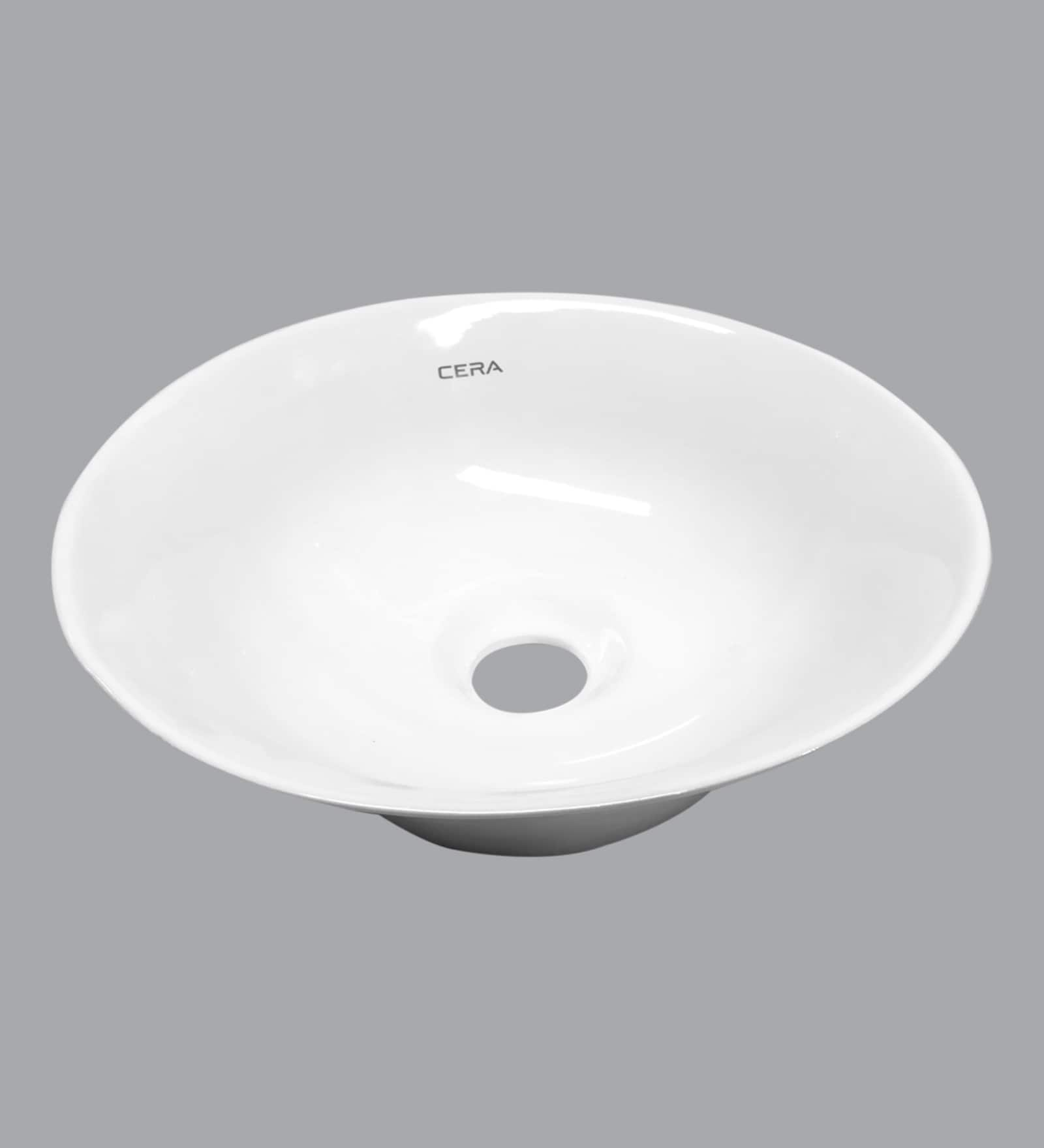 buy-ceramic-round-shape-white-counter-top-wash-basin-h-7-w-12-d