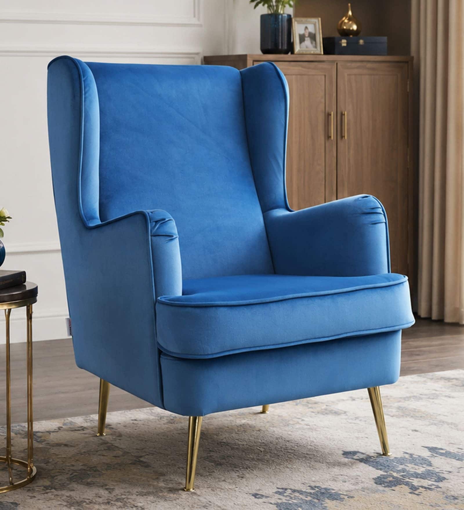 Charm Velvet Fabric Lounge Chair In Blue Colour
