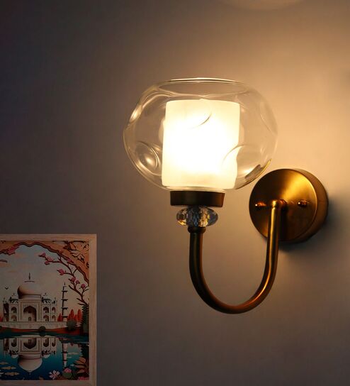 Contemporary Brass Sconce with Clear Crater  Glass