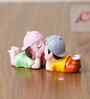 Couple Statue Sitting Sweet Stand Multicolour Polyresin Showpieces