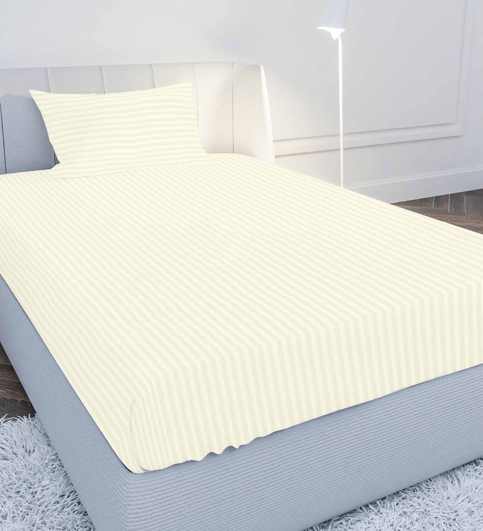 Cream Solid 210 TC Cotton Single Sized Bedsheet with 1 Pillow Cover Satin Stripe 2024 Collection