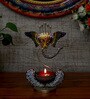 Metal Handpainted Decorative Ganesh Tea Light Showpiece in Multicolor