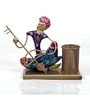 Metal Handpainted Decorative Musician Pen Stand Showpiece in Multicolor