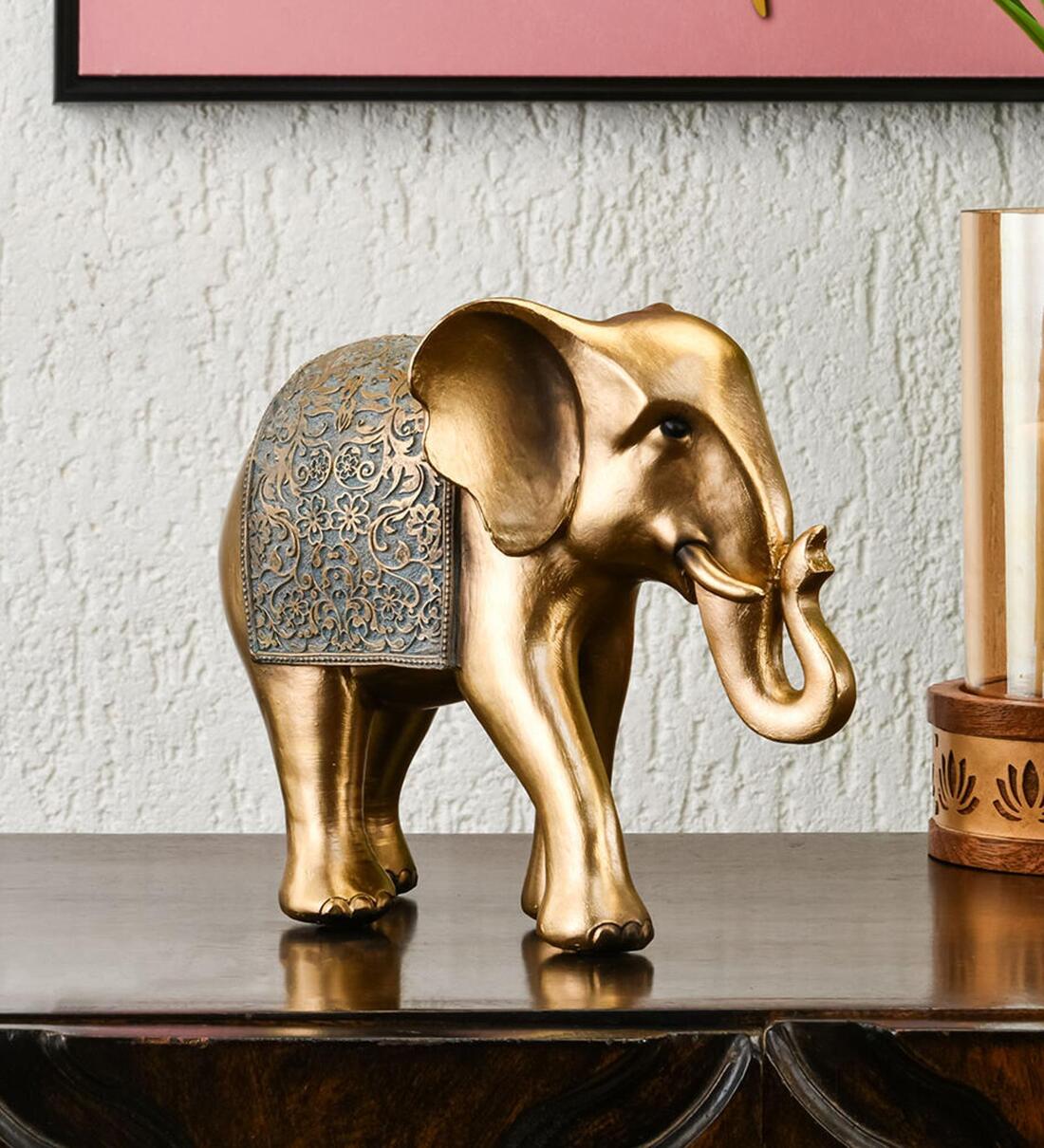 Buy Curl Trunk Elephant Grey & Gold Polyresin Animal Figurine at 100 OFF by home Pepperfry