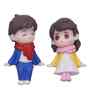 Cute Boy & Girl Sitting Multicolour Polyresin Showpieces