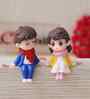 Cute Boy & Girl Sitting Multicolour Polyresin Showpieces