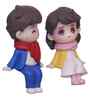 Cute Boy & Girl Sitting Multicolour Polyresin Showpieces