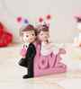 Cute Couple Love Multicolour Polyresin Showpieces