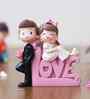 Cute Couple Love Multicolour Polyresin Showpieces