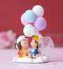 Cute Couple with Balloons Multicolour Polyresin Showpieces