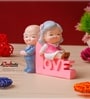 Cute Old Couple Sitting on Love Stand Showpiece Valentine Gift