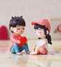 Cute Romantic Couple Multicolour Polyresin Showpieces