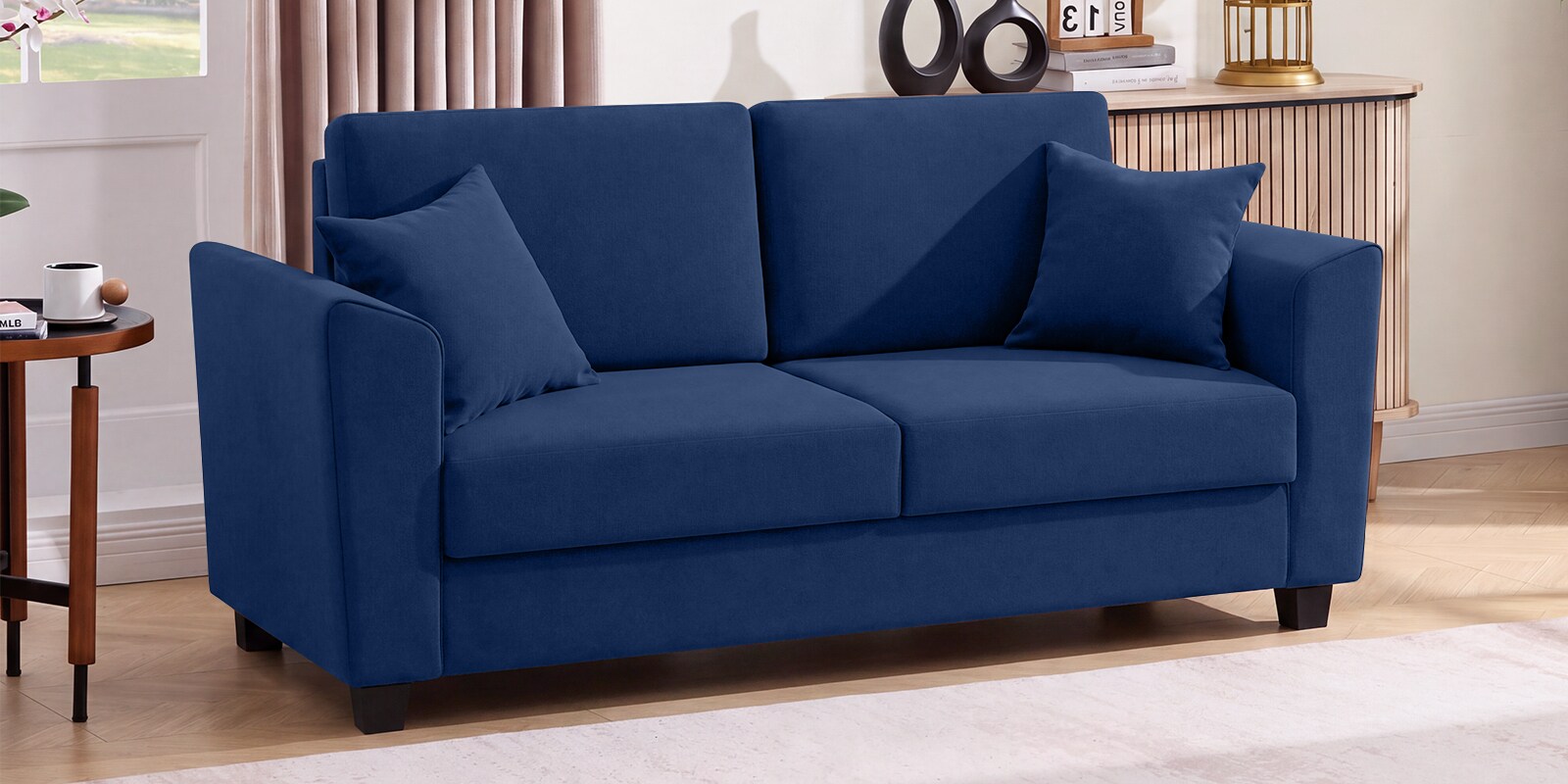 Daku Velvet Fabric 2 Seater Sofa In Beige Colour