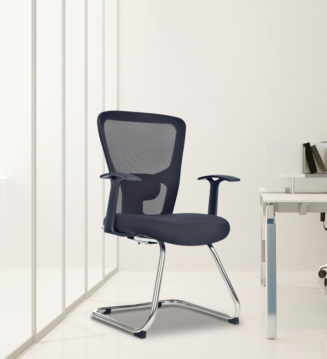 Define ergonomic chair in online black colour by durian