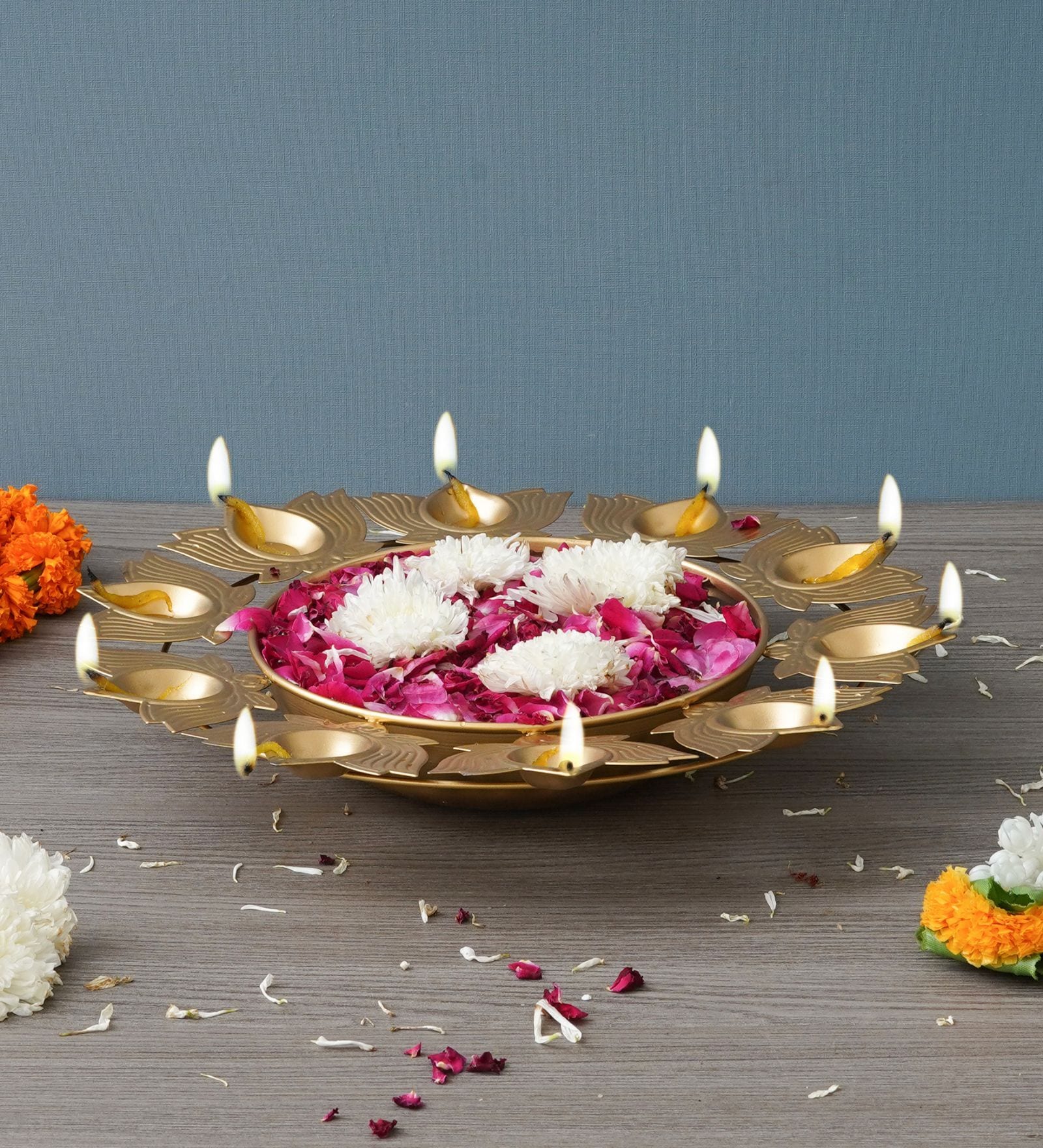 Designer Handcrafter Gold Metal Urli With Lotus Shape Diyas