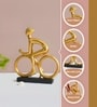 Golden Resin Cyclist Sculpture