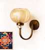 Decorative Brass Wall Light with Amber Glass Globe