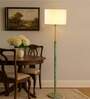 Devansh off-white cotton Drum shade with   floor lamp with wood base .-