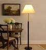 Devansh off-white cotton Drum shade with   floor lamp with wood base .-