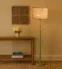 Devansh White cotton Drum shade with   floor lamp with wood base .-
