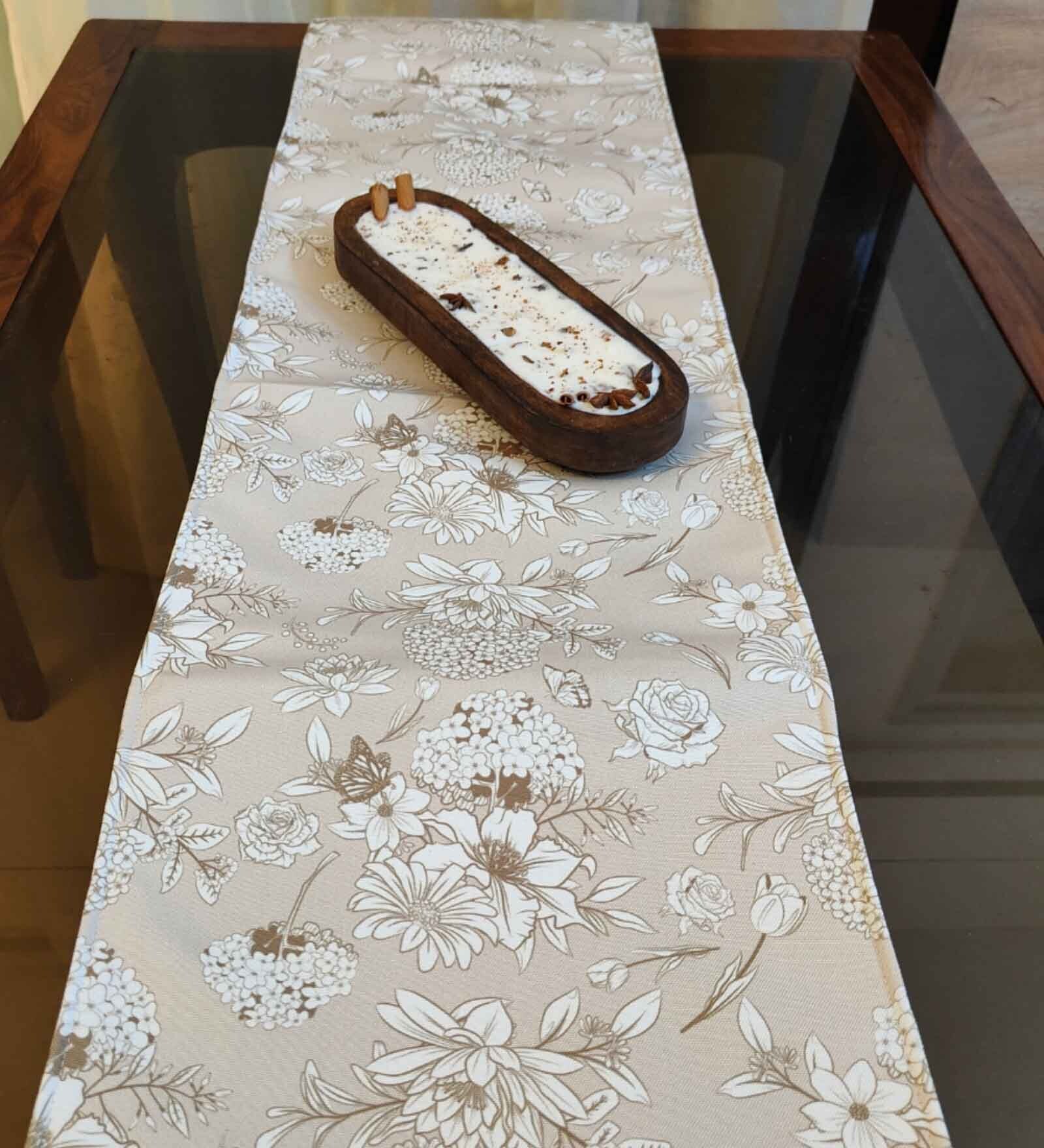 Discover the subtle beauty of our Light Flowers on Beige Background Table Runner, designed in 12 72 inches size.