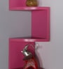 Engineered Wood Snack Shape Corner Wall Shelf In Pink Colour