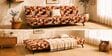 Dwayne Printed 3 Seater Sofa Cum Bed Orange Multi Color