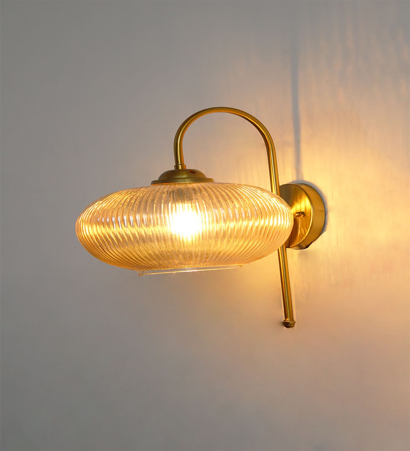 Elegant Brass Down Ribbed Amber Glass Wall Light