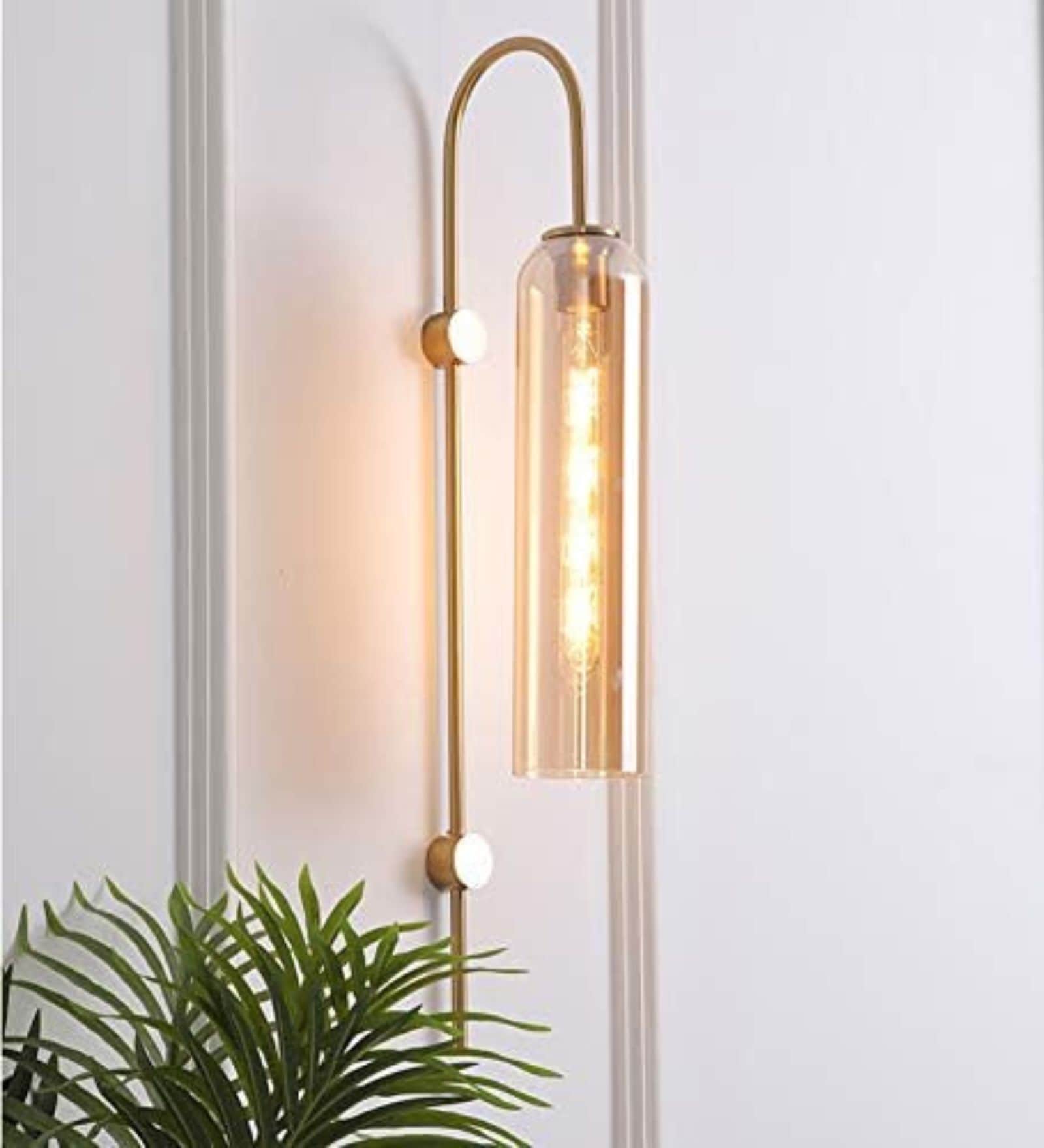Elegant Gold Wall Light with Clear Glass Tube