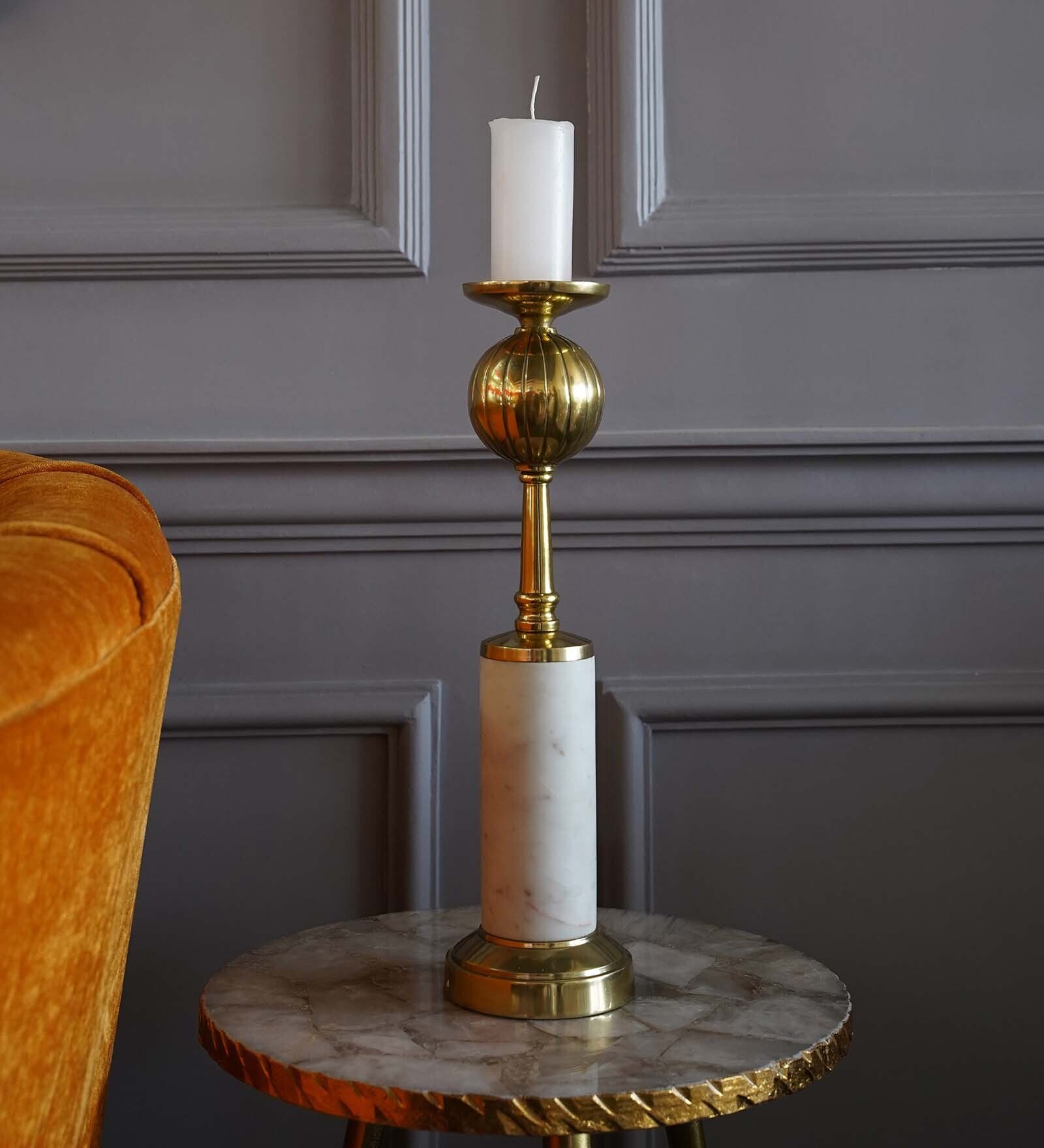 Buy Elliptic Gold Metal and marble Candle holder by FolkStorys at 39 OFF by Folkstorys Pepperfry