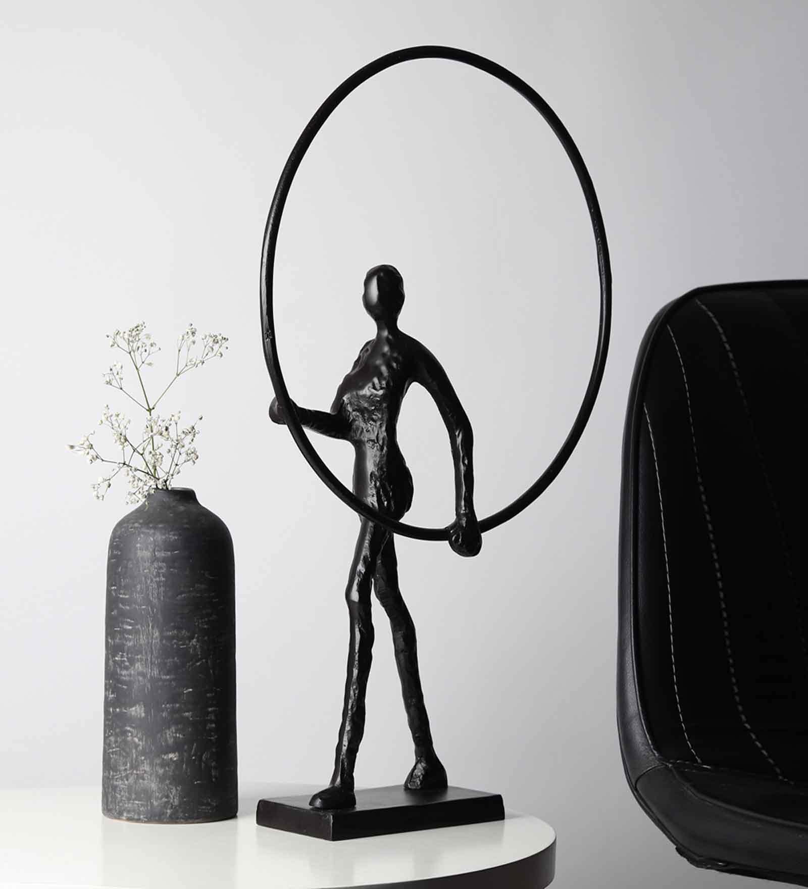 Enigmatic Embrace Black Aluminium Showpiece