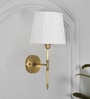 Epstein Single Light Wall Fitting In Antique Brass Finish With Cotton White Shade