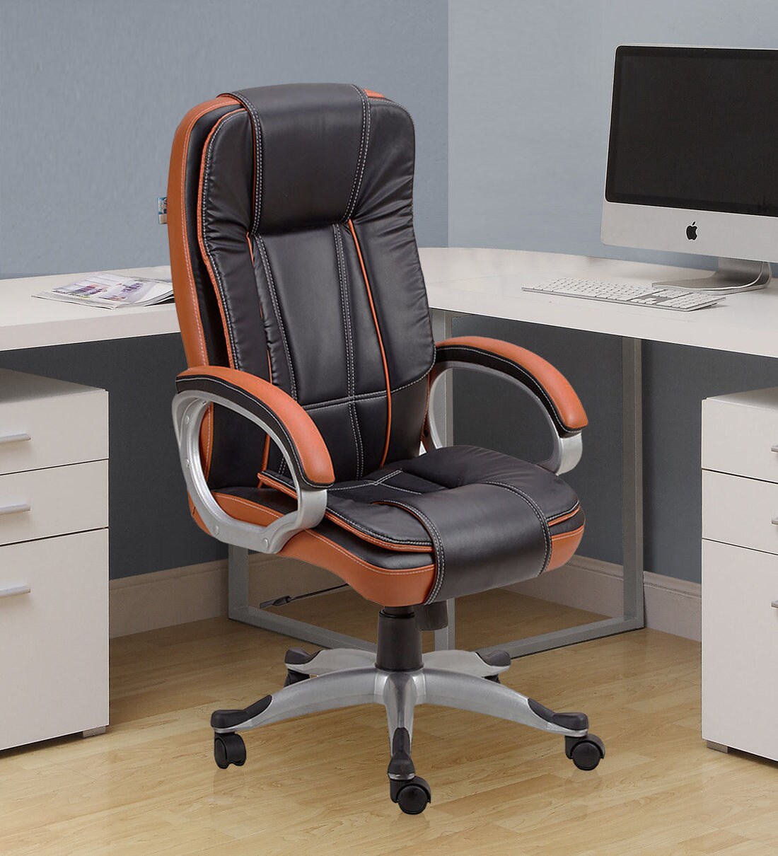 norah executive chair in black colour in tan colour