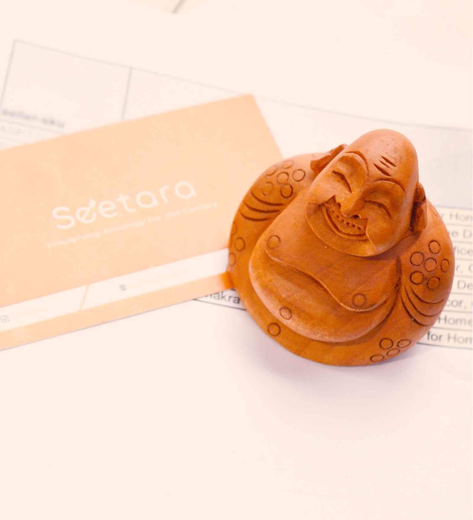 Orange Exquisite Handcarved Kadamwood Laughing Buddha for Joy, Prosperity, and Spiritual Harmony